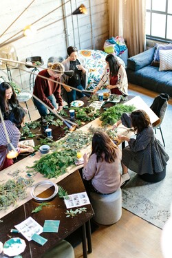 people gathered around a table indoors